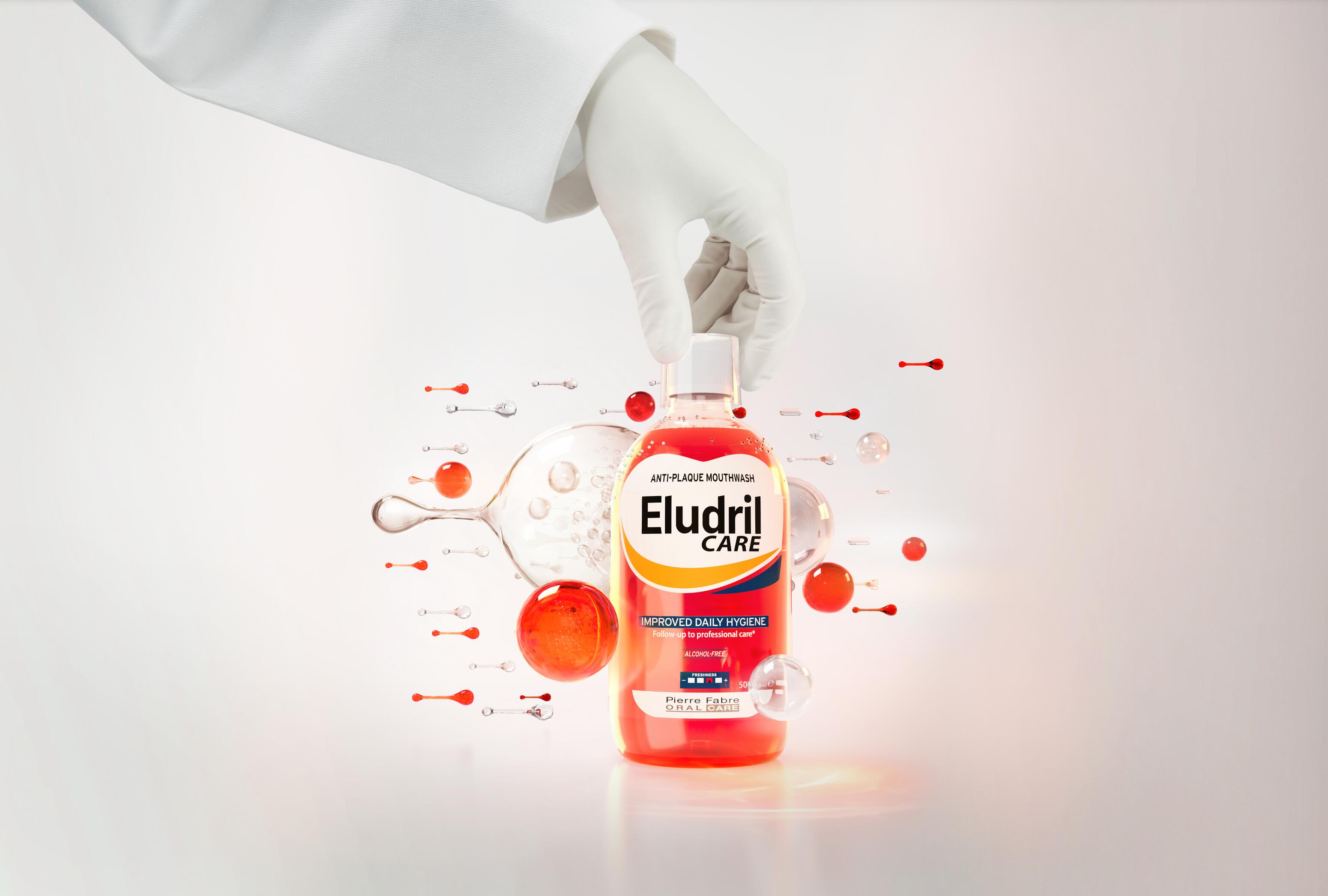 OC_ELUDRIL_CARE_MOUTHWASH_STATIQUE_EXPERTISE__PRODUCT WITH GLOVE_tif_2026__3577056021688-tif